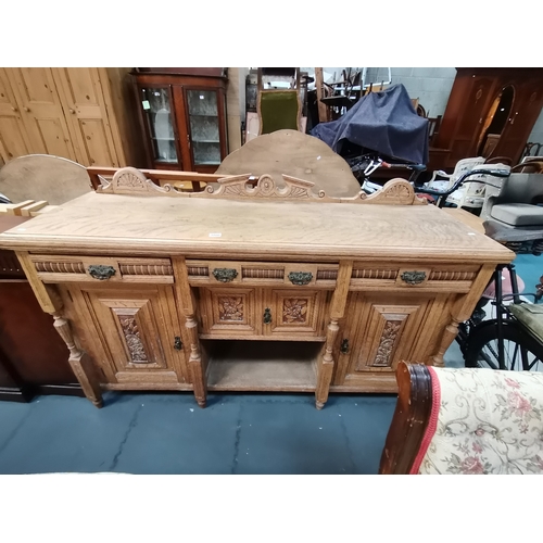 1000 - Carved Light Oak Sideboard L167cmCondition StatusGood: In good condition overall, but possibly some ... 