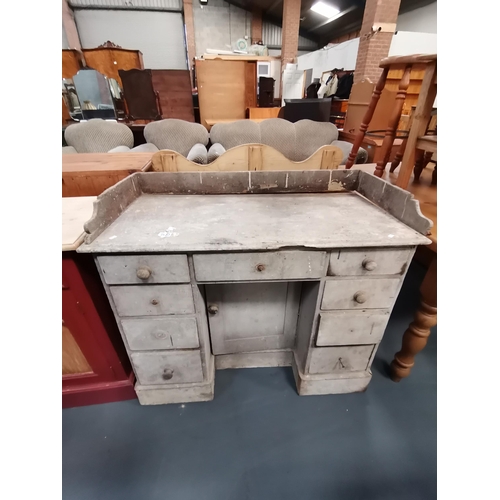 1033 - Distressed pine desk W107 in need of restorationCondition StatusPoor: In poor condition, significant... 