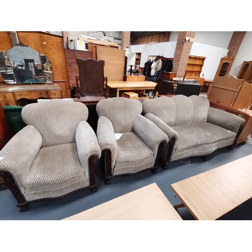 1045 - Vintage Three piece suite comprising of a 3 seat sofa with carved mahogany frame and pair of matchin... 