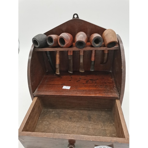 283 - A collection of old pipes on stand and lightersCondition StatusGood: In good condition overall, but ... 