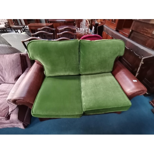 899 - Two seater soft leather sofa in Tan with spare set of upholstered green cushions W155cmCondition Sta... 