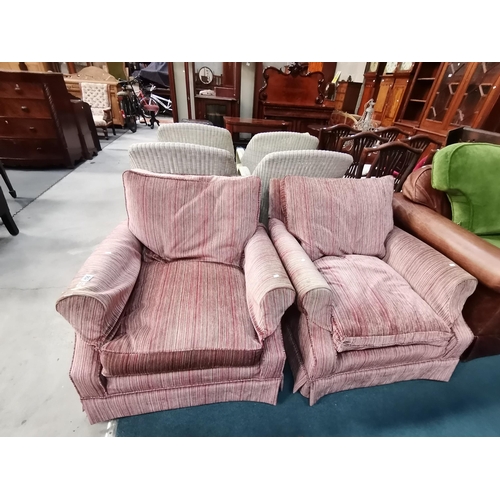 902 - A Pair of quality armchairs upholstered in thin stiped fabricCondition StatusGood: In good condition... 