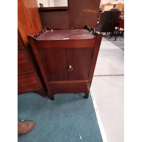 915 - Georgian Mahogany pot cupboard. Gallery top with shaped hand holds over a pair of cupboard doors. si... 