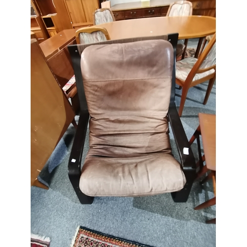 1168 - A pair of mid century style armchairs possibly Danish leather and wood in a faded good look plus nes... 