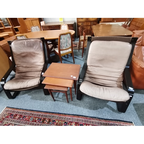 1168 - A pair of mid century style armchairs possibly Danish leather and wood in a faded good look plus nes... 