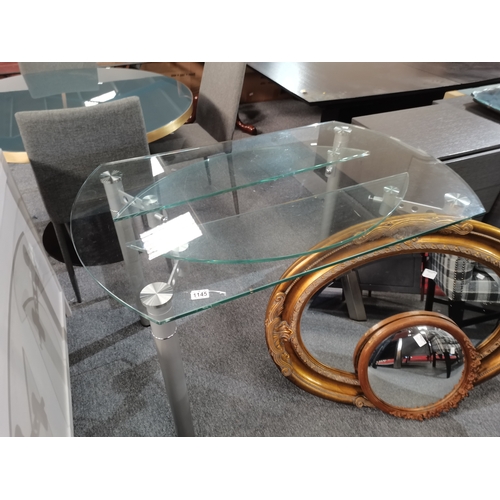 1145 - A modern glass dining table 1.2m xc 75cmCondition StatusGood: In good condition overall, but possibl... 