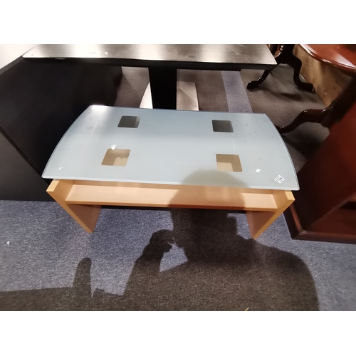 1154 - A modern glass and beech coffee table