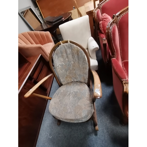 1192 - An Ercol rocking chair plus a Victorian mahogany turned legged armchair