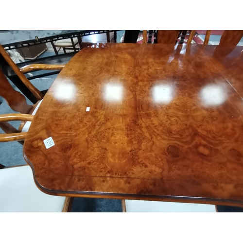 1211 - A top quality burr walnut extending dining table with 10 chairs all in excellent condition 2.8m long... 