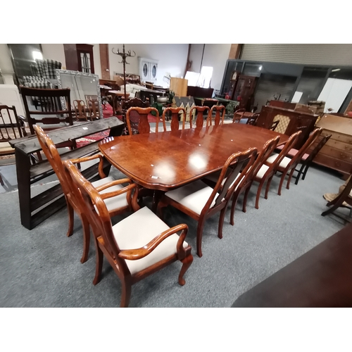 1211 - A top quality burr walnut extending dining table with 10 chairs all in excellent condition 2.8m long... 