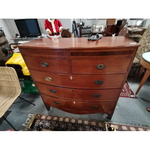 1229 - A Georgian mahogany bow fronted chest of drawersCondition StatusGood: In good condition overall, but... 