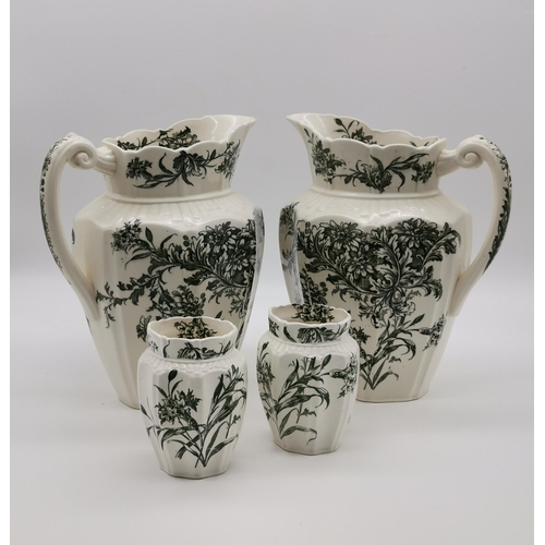 310 - A pair of Grange K & Co ceramic wash jugs decorated with green foliage to a cream ground, together w... 