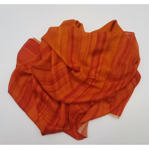 336 - A Bulgari silk and cashmere scarf, made in Italy, tonal yellow and red stripes to a graduated orange... 