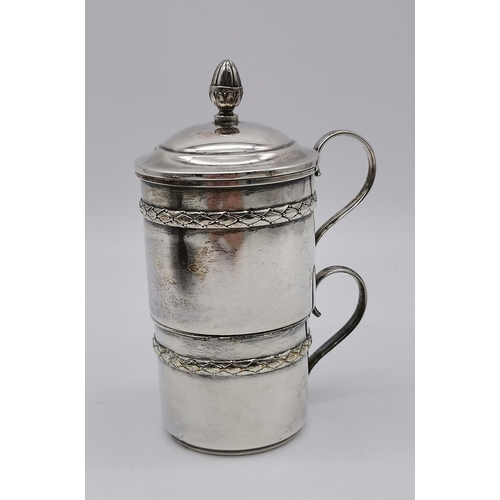 347 - A Continental silver-plated tea glass holder and tea strainer with cover, stamped mark to right of h... 