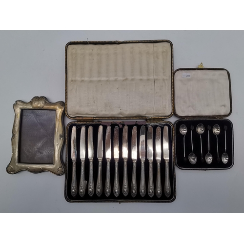 358 - A small group of assorted silver items, 20th Century, comprising an Edwardian photograph frame by Bo... 