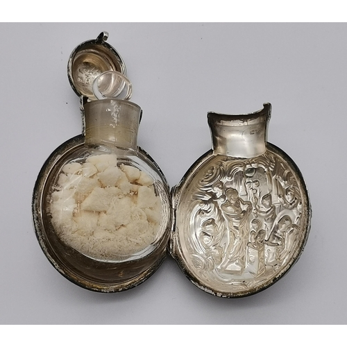 374 - A late Victorian silver cased scent bottle by William Comyns & Sons, London 1899, the hinged case ch... 