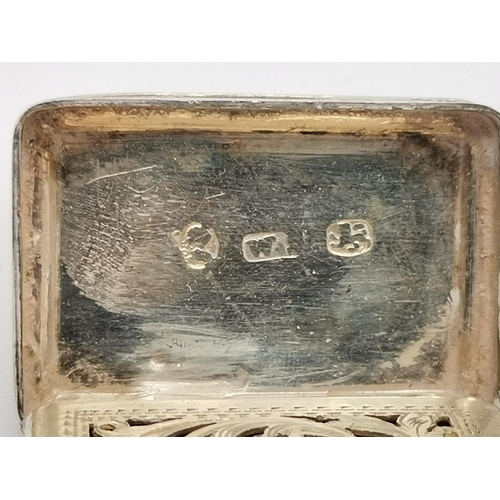 375 - A George IV silver vinaigrette by Ledsam & Vale, Birmingham 1823, rectangular with canted corners, t... 