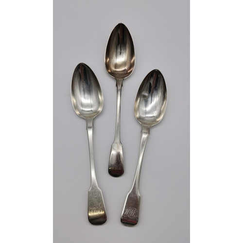 383 - Three Georgian silver Fiddle pattern tablespoons, the first by James Barber & William Whitwell, York... 