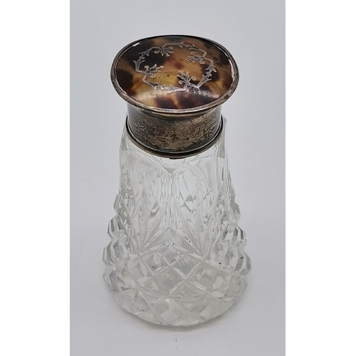 393 - A 19th Century silver cased scent bottle, marks heavily rubbed, heart shaped, chased all over with s... 