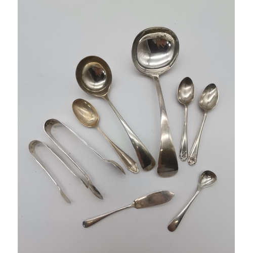 412 - A small quantity of assorted 20th Century silver flatware including a sauce ladle by Deykin & Harris... 