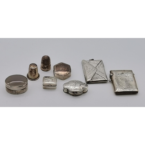 420 - A mixed group of assorted small silver, various makers and dates, including miniature photograph fra... 