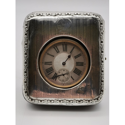 421 - An Edwardian silver-mounted pocket watch case and stand by Harry Synyer & Charles Joseph Beddoes, Bi... 