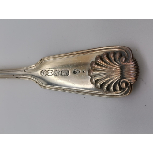 423 - A quantity of Victorian silver spoons, Fiddle, thread and shell pattern, by George William Adams, Lo... 