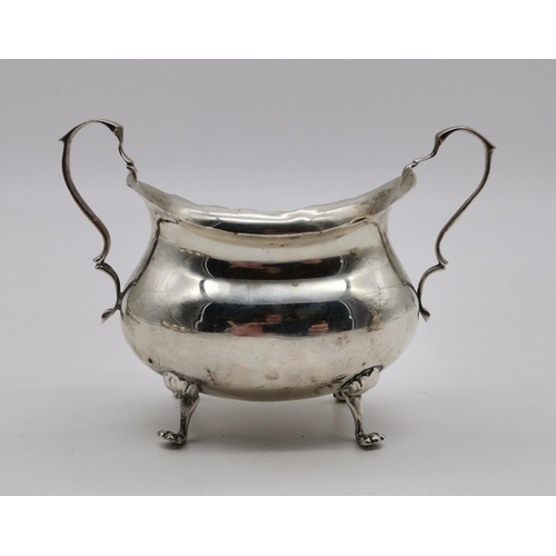 429 - A George III silver cream jug by Abraham Peterson, London 1798, oval with reeded edge and strap hand... 