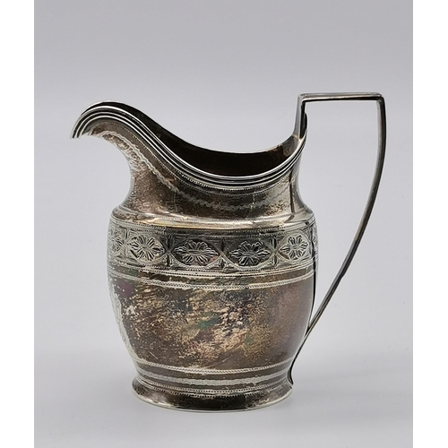 429 - A George III silver cream jug by Abraham Peterson, London 1798, oval with reeded edge and strap hand... 