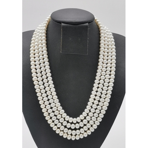 480 - A French graduated four-strand cultured pearl necklace, stamped FRANCE to the metal clasp; together ... 