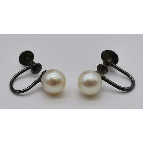 480 - A French graduated four-strand cultured pearl necklace, stamped FRANCE to the metal clasp; together ... 