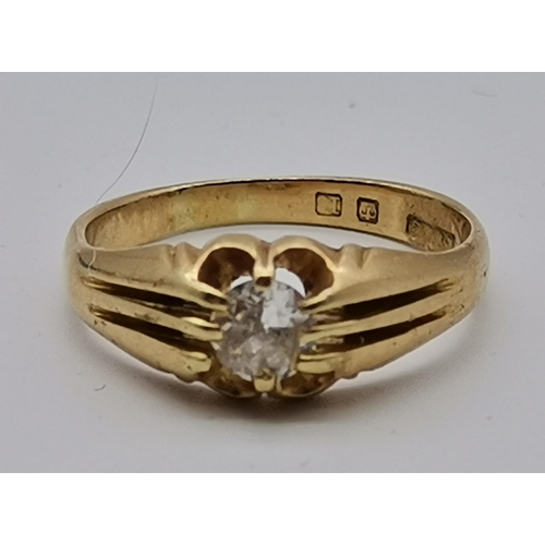 485 - An 18 carat gold diamond solitaire ring, the stone claw-set to a fancy flowerhead openwork setting, ... 