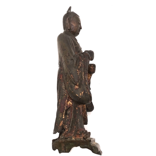 537 - A Chinese bronze figural statue, likely Ming dynasty, made using the lost wax method, with gilt and ... 