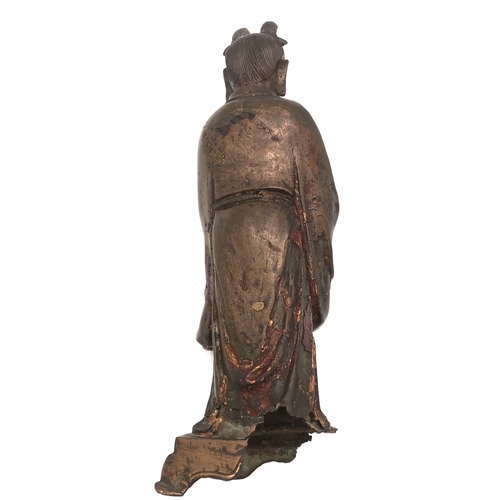 537 - A Chinese bronze figural statue, likely Ming dynasty, made using the lost wax method, with gilt and ... 