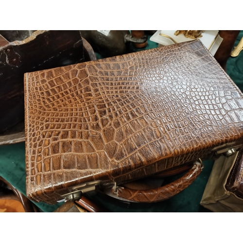 24 - An Antique Leather / poss. crocodile correspondence case plus Vanity case with original case protect... 