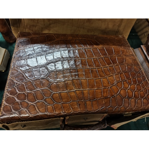 24 - An Antique Leather / poss. crocodile correspondence case plus Vanity case with original case protect... 