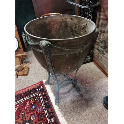 13 - A Regency style brass twin-handled wine cooler / coal bucket, lidded urn-form, the domed circular co... 