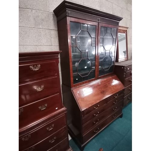 857 - Georgian Mahogany Bureau Bookcase with carved cornice above glazed doors opening to reveal three adj... 