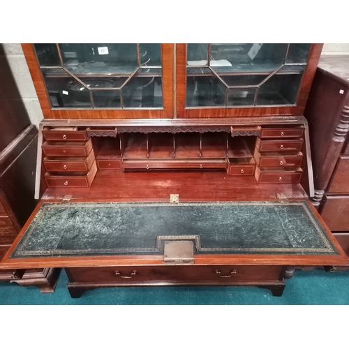 857 - Georgian Mahogany Bureau Bookcase with carved cornice above glazed doors opening to reveal three adj... 