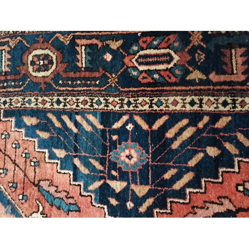 1149k - A large runner in mainly blue, red and cream highly decorated 3m x 90cm