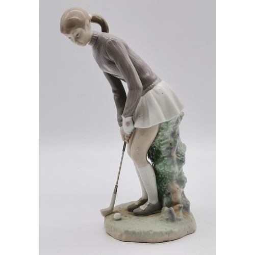 111 - Lladro 'Female Golfer' produced between 1972-1992 4851 sculpted by Vincente Martinez H27.5cm plus Ll... 