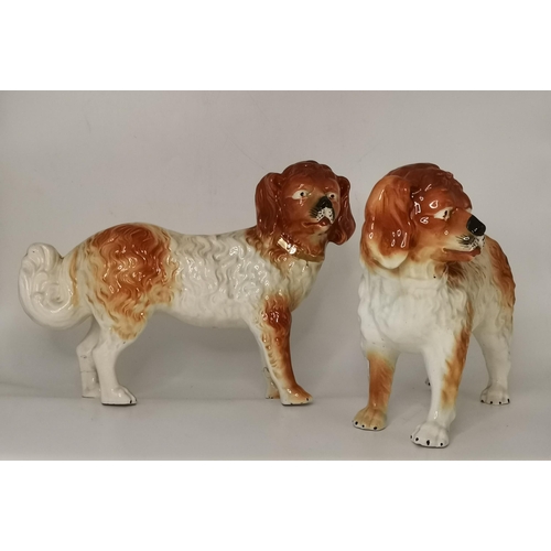 114 - A pair of Victorian pottery Wally dogs, possibly Bo'ness, modelled standing, unmarked. (2) 28cm high