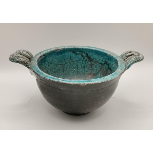 116 - Four pieces of studio pottery, comprising a square pedestal dish by Jackie Walton; a shallow twin-ha... 