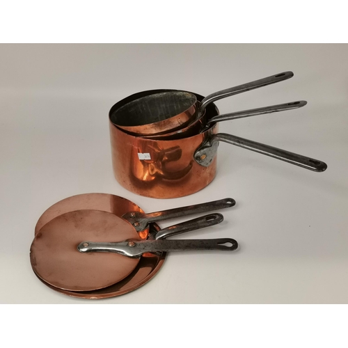 124 - A set of three English Copper Sauce pans with lids, one of them an early dovetailed Benham & Froud l... 