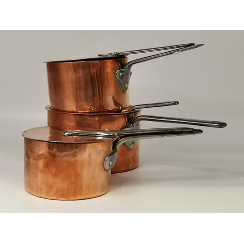 124 - A set of three English Copper Sauce pans with lids, one of them an early dovetailed Benham & Froud l... 