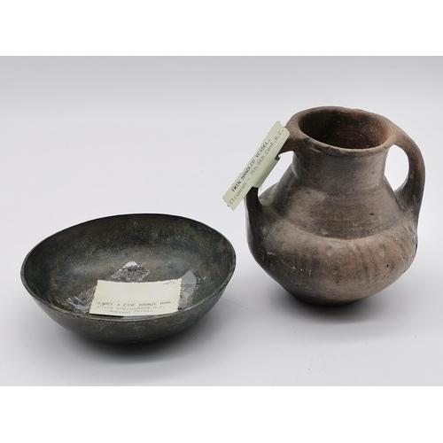 126 - A collection of Ancient Artefacts - including Etruscan twin handled vessel 7th/8th cent B.C H 12.5cm... 