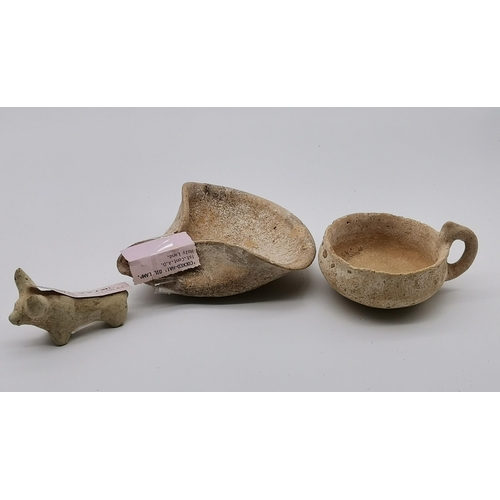 126 - A collection of Ancient Artefacts - including Etruscan twin handled vessel 7th/8th cent B.C H 12.5cm... 