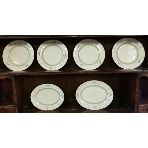 130 - x6 Clarice Cliff pieces - four circular dinner plates 25cm diameter and two oval platters 32cm x 14.... 