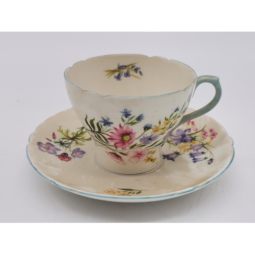 133 - Shelley 'Wild Flowers' Tea Set - x9 plates, Side Plates, Cups and Saucers, Sandwich Plate, Milk Jug ... 