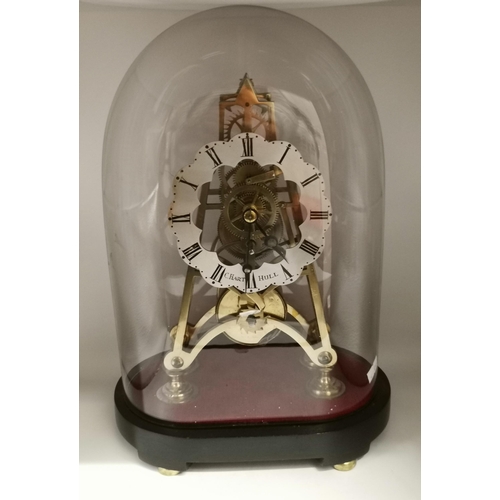 139 - Victorian skeleton clock with glass dome on ebonised base by C Hart Hull (1846 - 1863) 37cm height; ... 